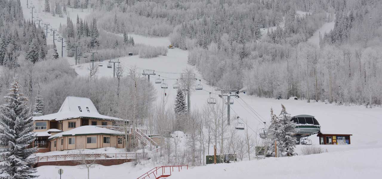 Winter view of he ski lift and base camp at Powderhorn Resort in Mesa, Colorado