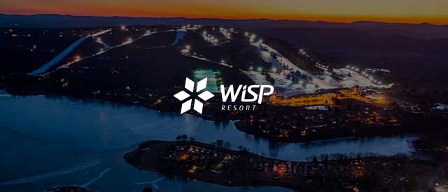 Wisp Resort logo over the Wisp Resort buildings faded out.